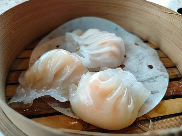 istock Steamed Shrimp Dumplings with Spicy Dipping Sauce 2213133764