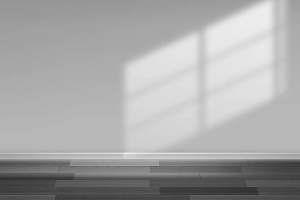 istock Monochrome background illustration of a room with sunlight streaming in through a window. 2213143599