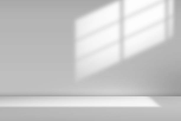 istock Monochrome background illustration of a room with sunlight streaming in through a window. 2213143605
