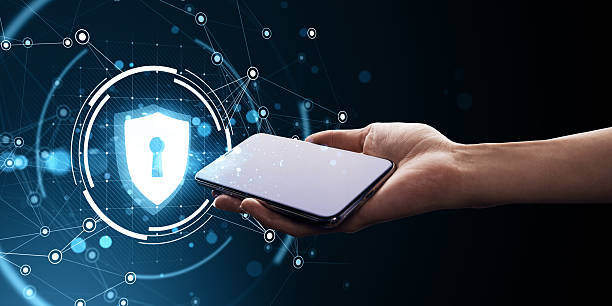 istock Smartphone in hand with digital cybersecurity lock icon on abstract technology background representing data protection concept in business environment. 2213146115