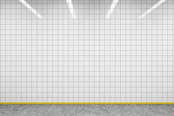 istock Blank tiled wall with overhead lights in subway station interior, empty space for poster mockup or branding design concept. 3D Rendering. 3D Rendering 2213146281