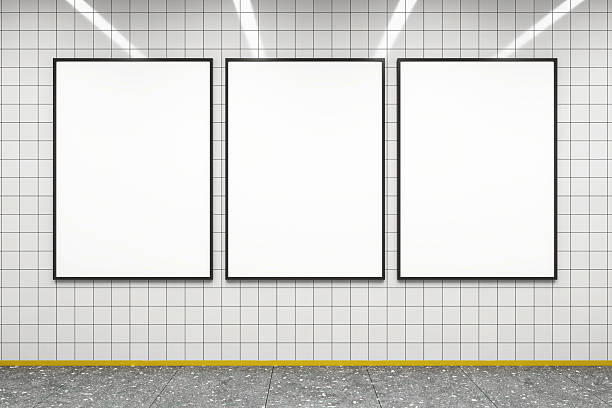 istock Three blank vertical poster mockups on a tiled subway wall in a modern corridor with clean lighting for advertising or exhibition presentation. 3D Rendering 2213146284