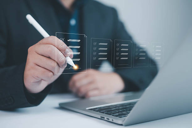 istock Digital Signature technology office. Businessman using smartphone to sign document using pen,  Online business E-signing on network connection. digital document management, Signing a signature 2213146553