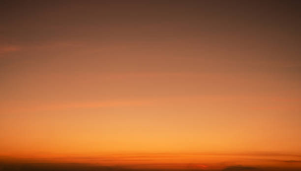 istock Calming orange sunset glows above peaceful horizon in summer. Peaceful sky at dusk create serene atmosphere for relaxation meditation background nature landscape scenic view summer evening tranquility 2213150935