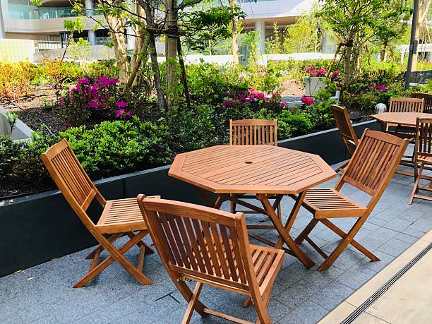 istock Table and chairs in outdoor space 2213153933