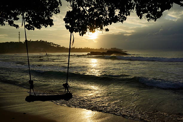 istock beach in mirissa, sri lanka, from sunrise to sunset 2213154643