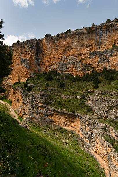 istock Stunning canyon landscape featuring rocky cliffs and lush vegetation in a remote area during daytime 2213154835