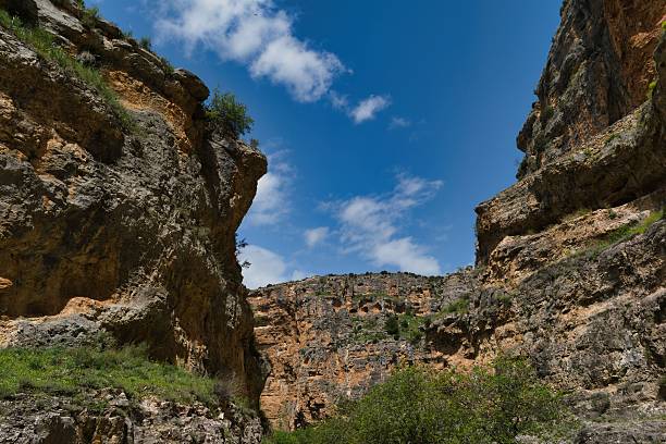 istock Majestic canyon landscape showcasing towering cliffs and bright blue sky during midday in a tranquil natural setting 2213154845