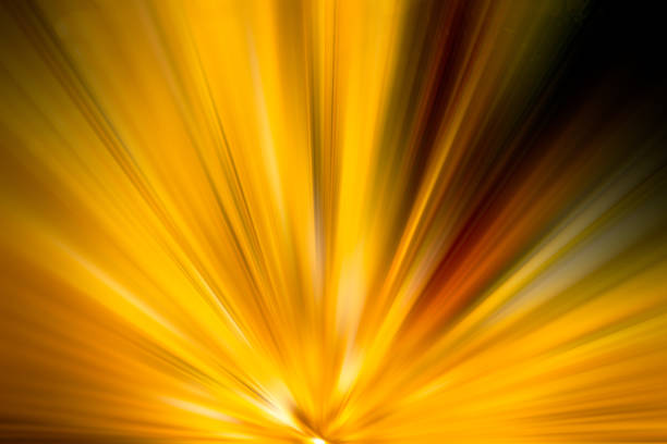 Abstract high-energy on golden  motion light  effects on spectrum light burst artwork featuring glowing lines and radiant color blending into a dark background.