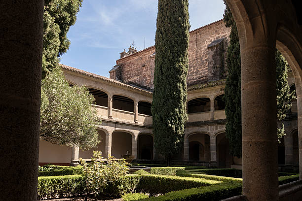 istock Yuste monastery cloister showing cypress trees and garden 2213168527