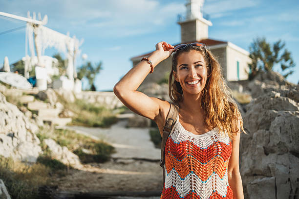 istock Woman Enjoying A Summer Vacation While Exploring Mediterranean Coast 2213171142