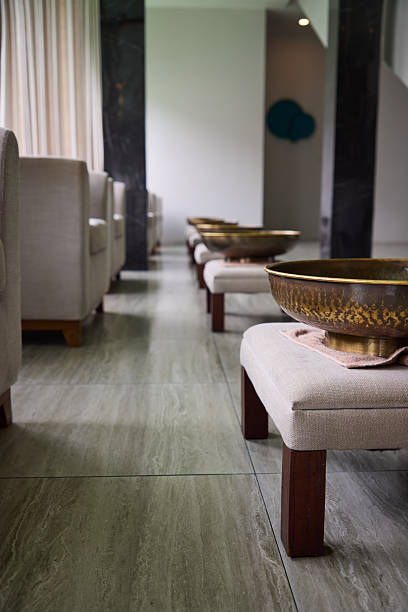 Luxurious spa interior with chairs, bowls, and serene ambiance for relaxation
