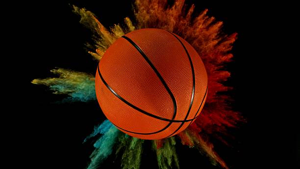 istock Basketball ball with coloured powder explosion. 2213175840