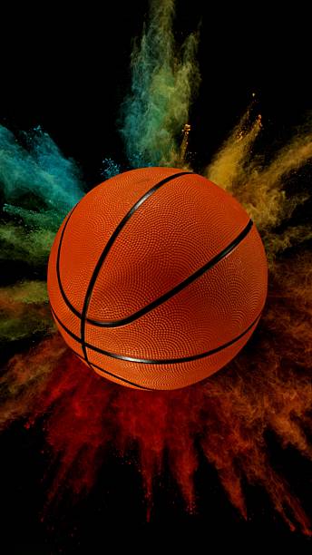 istock Basketball ball with coloured powder explosion. 2213175847