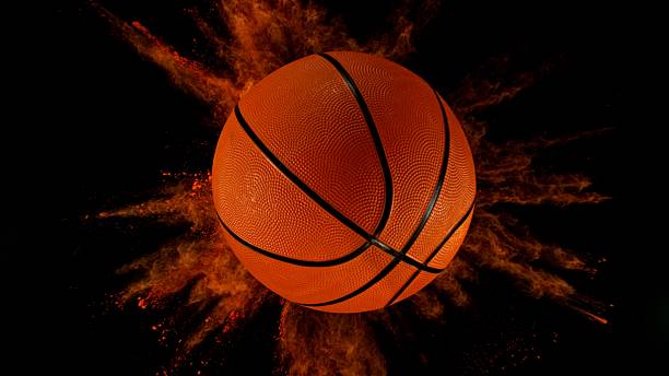 istock Basketball ball with coloured powder explosion. 2213175849