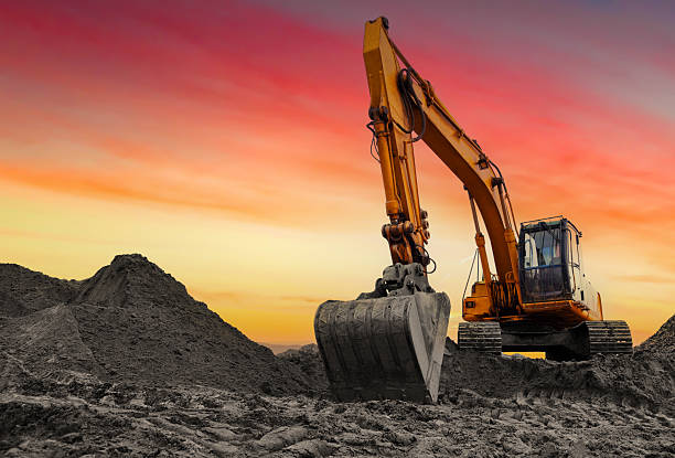 istock Coal mining in an open-pit. Excavator on Coal mining. Excavator digging in open pit coal mine. 2213179175