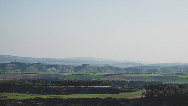 istock Rolling Hills and Farmland Landscape in Early Spring 2213180782