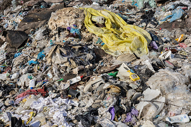 istock A landfill overflowing with discarded plastic, clothes, and garbage highlights the urgent need for better waste management and recycling practices 2213181287