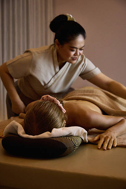 istock Professional massage therapy session offering relaxation and wellness in a spa environment 2213181743