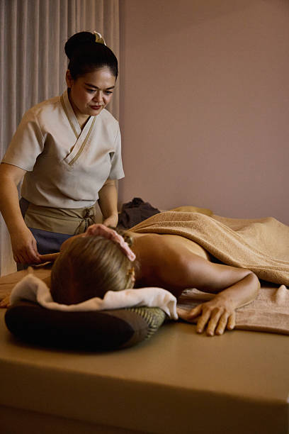 istock Professional massage therapist providing a relaxing treatment in a spa room setting 2213181760