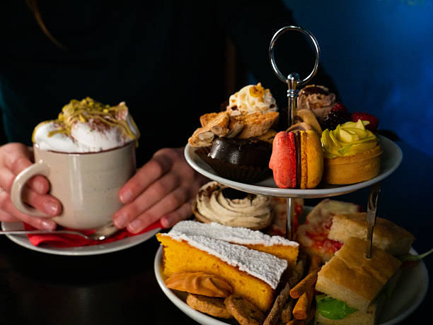 istock Enjoying Afternoon Tea with Coffee and Pastries 2213195557