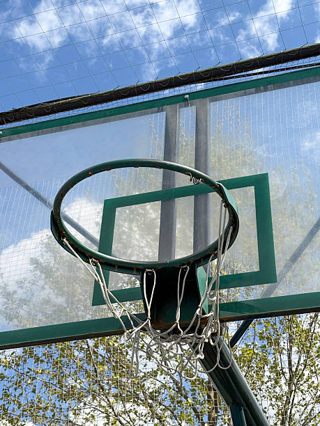 istock Basketball hoop with sky background 2213197531