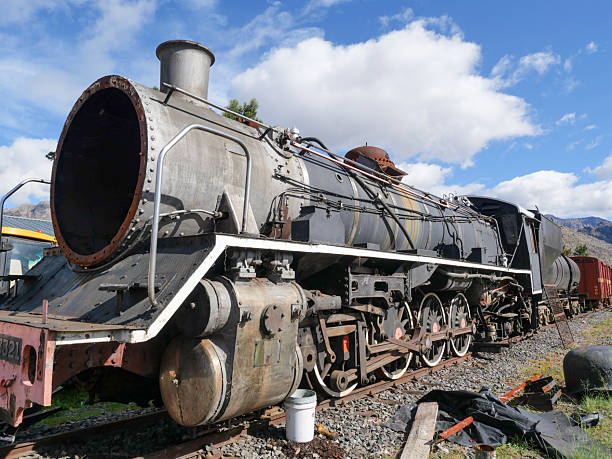 Old dilapidated steam locomotive close-up view