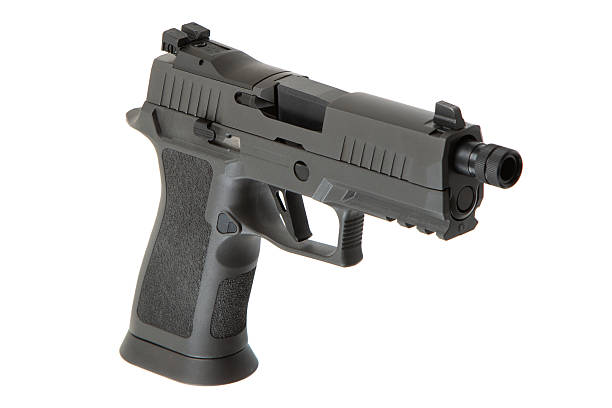 istock Khaki-colored handgun with a textured grip, side view, isolated on a white background, modern firearm design, suitable for self-defense or law enforcement use. 2213199674