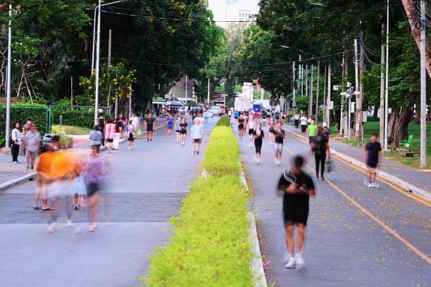 istock blurred of running  people on road 2213216637