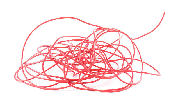 istock Tangled insulated electrical wire isolated on white 2213221679