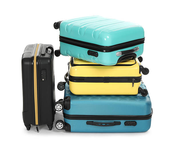 istock Stack of colorful suitcases isolated on white 2213223267
