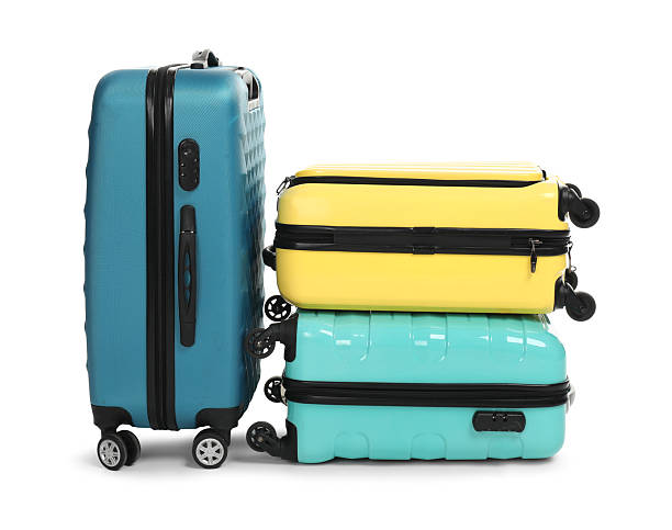 istock Many closed colorful suitcases isolated on white 2213223334