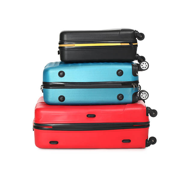istock Stack of colorful suitcases isolated on white 2213223369