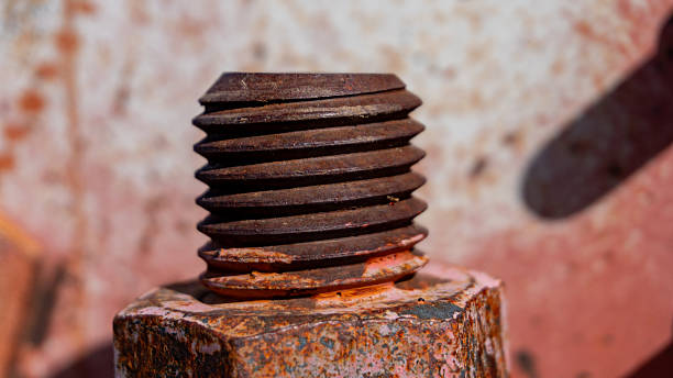 istock Close-up of a rusty bolt with corroded threads 2213225223