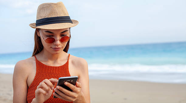 istock young woman relaxing at the beach 2213225644