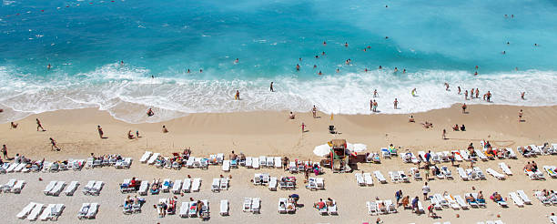 people swimming at the beach