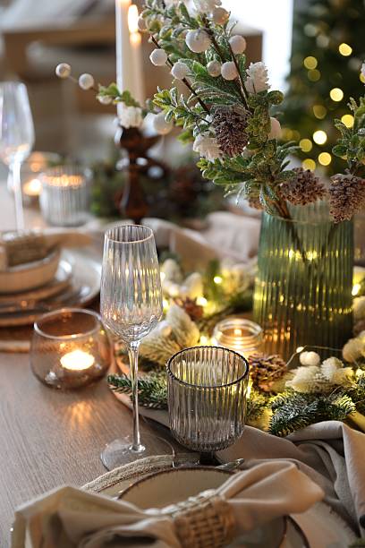 istock Christmas place setting with festive decor on wooden table in room 2213231924