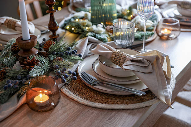istock Christmas place setting with festive decor on wooden table in room 2213231957