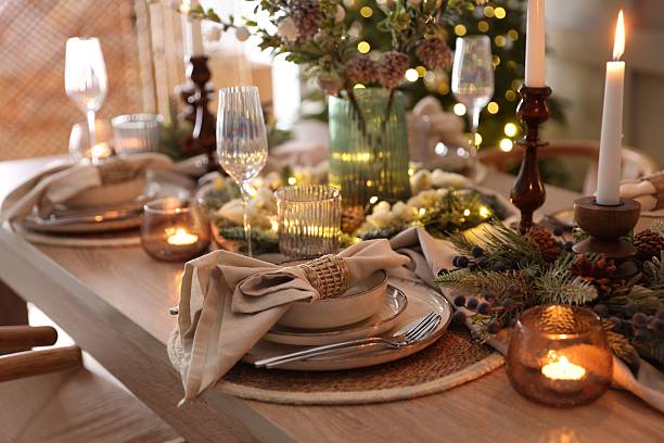 istock Christmas place setting with festive decor on wooden table in room 2213232006