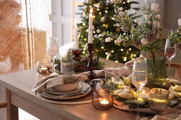 istock Christmas place setting with festive decor on wooden table in room 2213232036