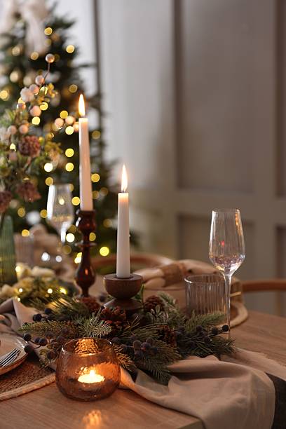 istock Christmas place setting with festive decor on wooden table in room 2213232050