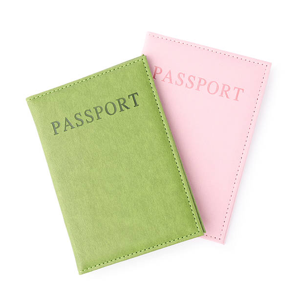 istock Passports in bright covers isolated on white, top view 2213232474