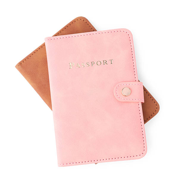 istock Passports in bright covers isolated on white, top view 2213232482