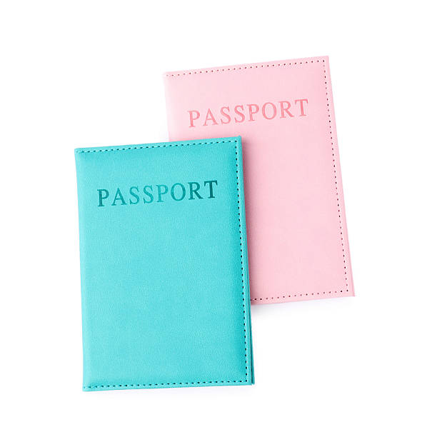 istock Passports in bright covers isolated on white, top view 2213232510