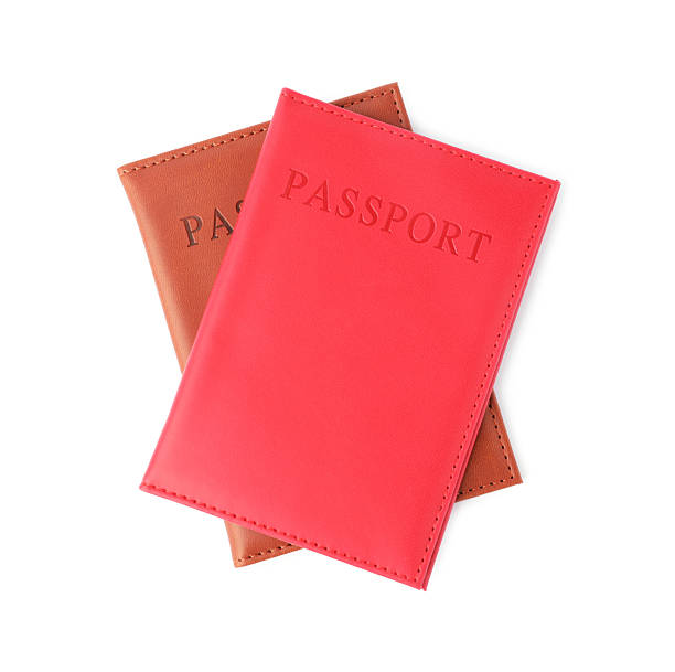 istock Passports in bright covers isolated on white, top view 2213232553