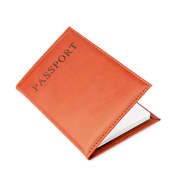 istock Passport in leather cover isolated on white 2213232554