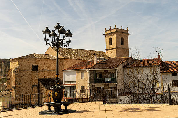 The Church of Trillo (Gualajara- Spain) can be seen from many points of the village. This image is taken from a square on the other side of the waterfall.