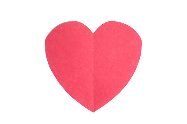 istock Valentine's Day concept. Red heart-shaped paper isolated on white background 2213239644