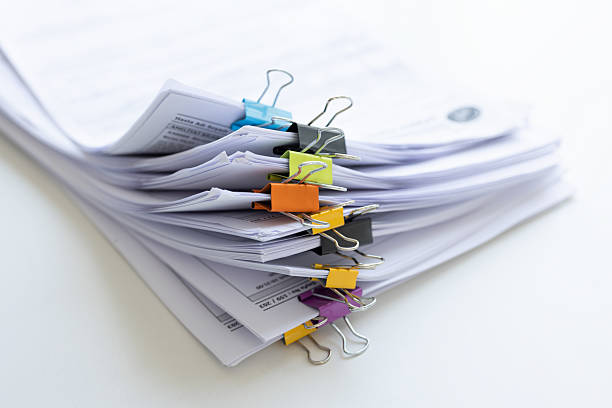 Heap of documents clipped with clips
