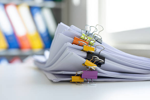 Heap of documents clipped with clips